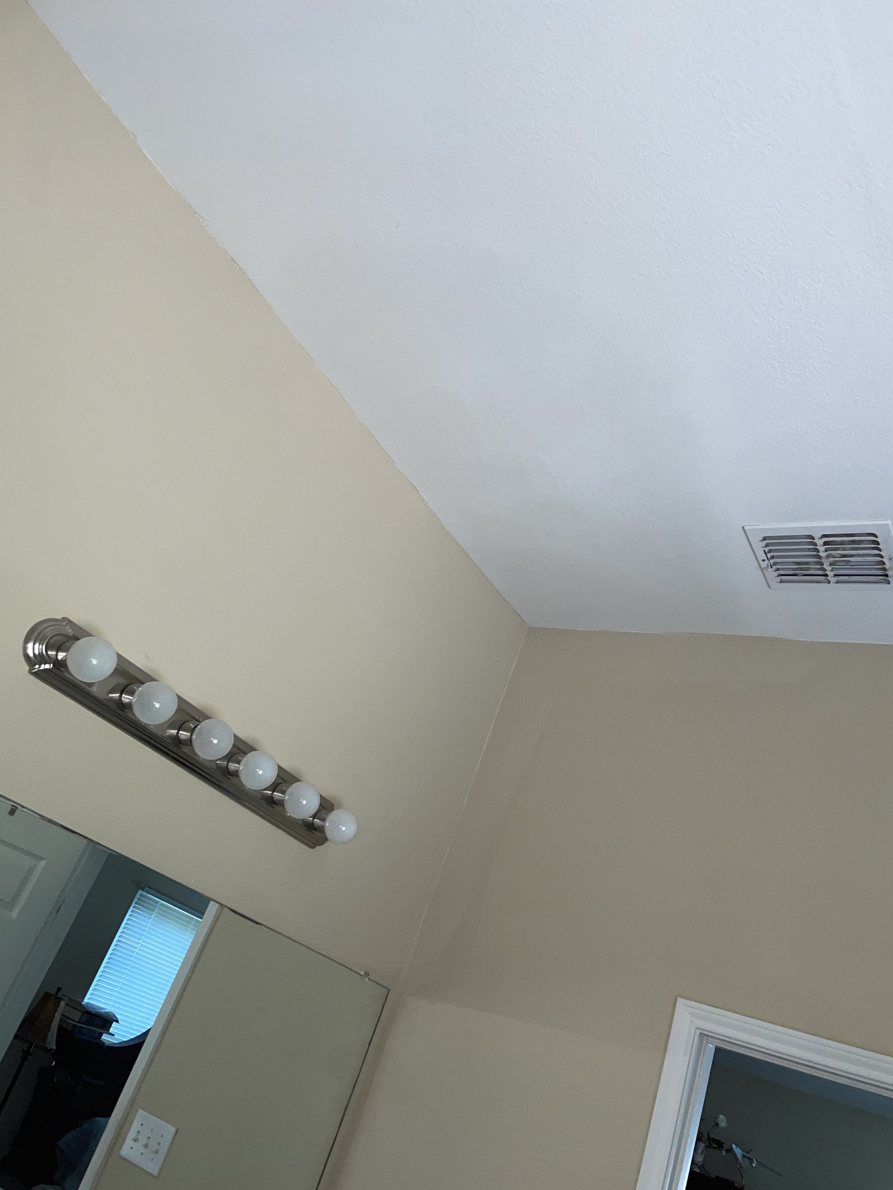 Finished bathroom ceiling repair
